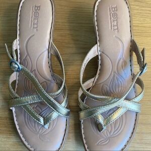 Born metallic gold buckle strap sandals with block heel.